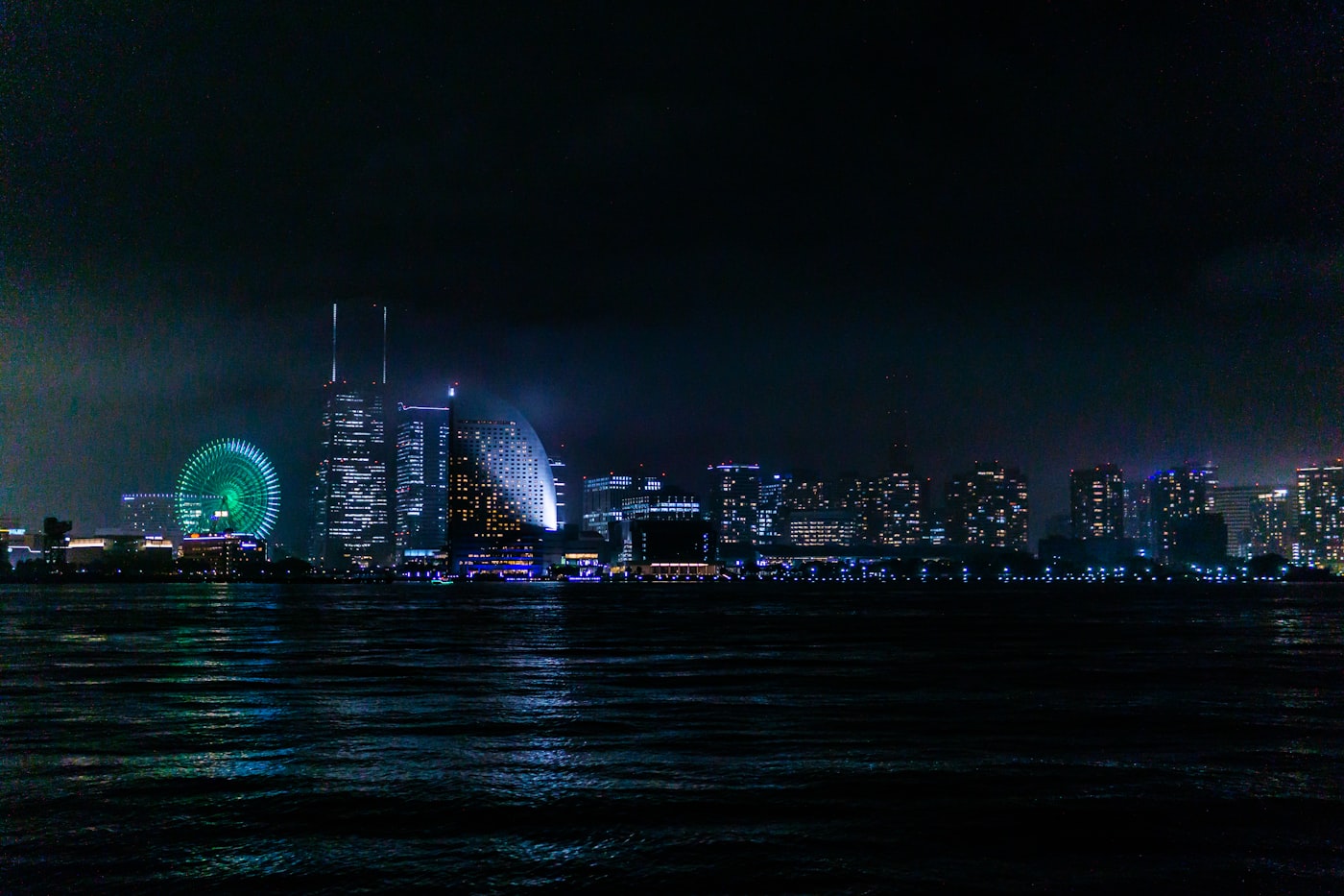 Yokohama waterfront and Minato Mirai skyline illuminated in the evening