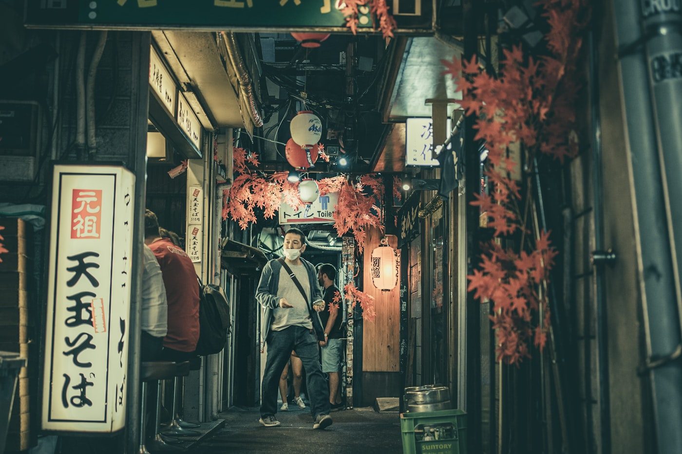 A narrow lantern-lit izakaya alley in Tokyo