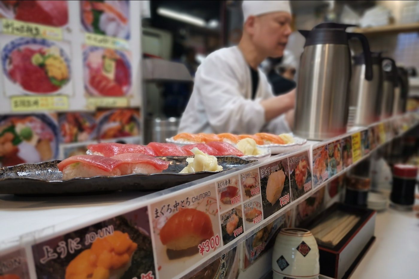 A vendor and fresh seafood at Tsukiji Outer Market