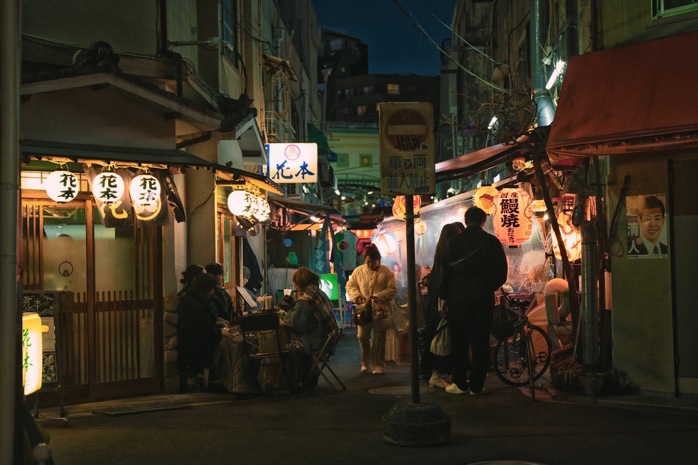 Lively restaurant and bar streets illuminated at night in Akasaka, Tokyo
